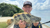 Ryan Ngler catches another orange spotted grouper in the Southern Islands on the 40g Bozles Matsukaze Tungsten Jig (Green and Gold), paired with the Gamakatsu Assist 59 Light Fibre Plus Assist Hooks, Size 1/0